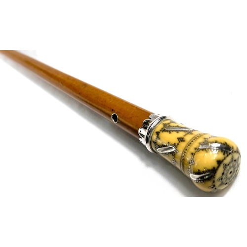 15 - A Georgian Malacca cane walking stick with silver pique work ivory finial (the pierced top unscrews ... 