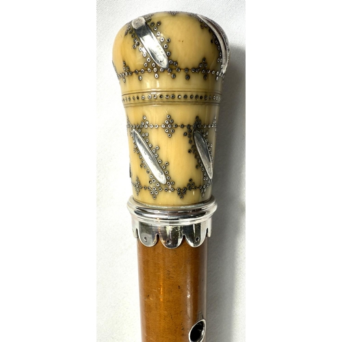 15 - A Georgian Malacca cane walking stick with silver pique work ivory finial (the pierced top unscrews ... 