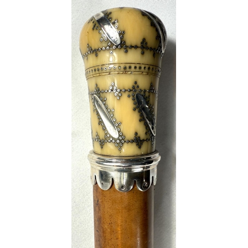 15 - A Georgian Malacca cane walking stick with silver pique work ivory finial (the pierced top unscrews ... 