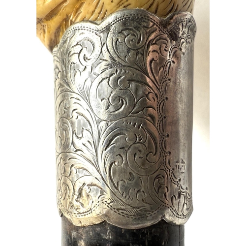 16 - A 19th Century ebony walking stick with carved ivory finial of a rottweiler, 90cms..Submission refer... 