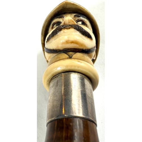 18 - A novelty 19th Century cane walking stick, the carved ivory finial in the form of a police constable... 