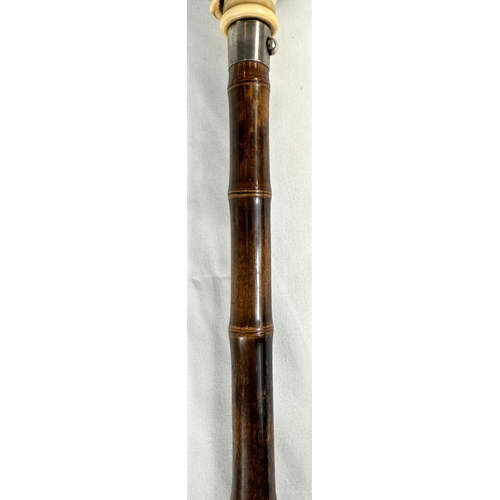 18 - A novelty 19th Century cane walking stick, the carved ivory finial in the form of a police constable... 