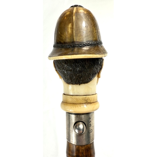 18 - A novelty 19th Century cane walking stick, the carved ivory finial in the form of a police constable... 