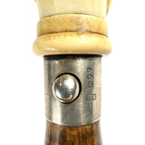 18 - A novelty 19th Century cane walking stick, the carved ivory finial in the form of a police constable... 