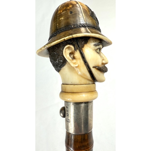 18 - A novelty 19th Century cane walking stick, the carved ivory finial in the form of a police constable... 