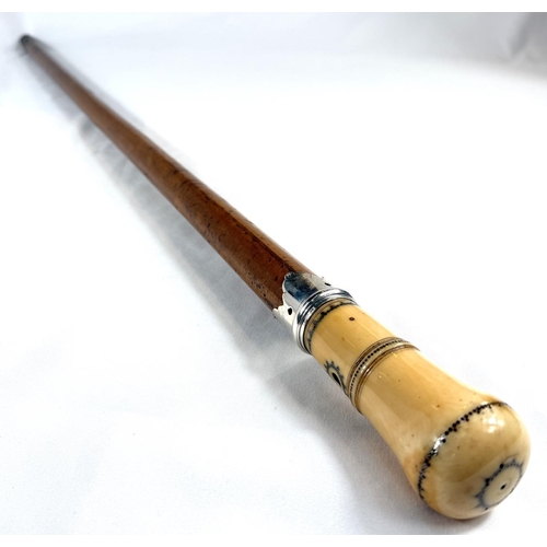 19 - A mid-Georgian period Malacca walking stick having silver mounted and pique work polished ivory fini... 