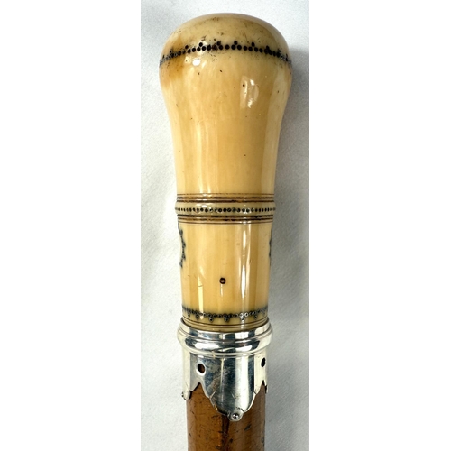 19 - A mid-Georgian period Malacca walking stick having silver mounted and pique work polished ivory fini... 