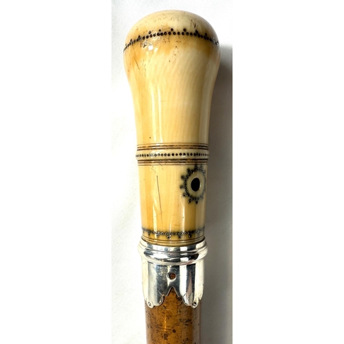 19 - A mid-Georgian period Malacca walking stick having silver mounted and pique work polished ivory fini... 