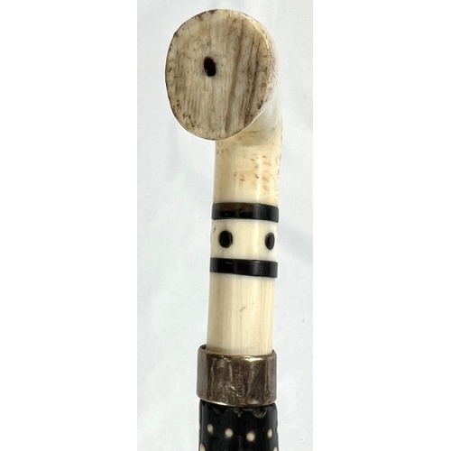 2 - A late 19th/early 20th Century Indian horn walking stick with ivory dot inlays and six others simila... 