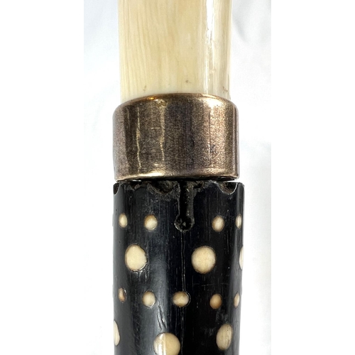 2 - A late 19th/early 20th Century Indian horn walking stick with ivory dot inlays and six others simila... 