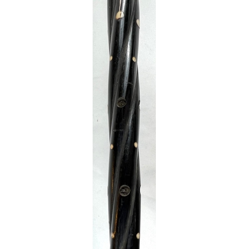 2 - A late 19th/early 20th Century Indian horn walking stick with ivory dot inlays and six others simila... 