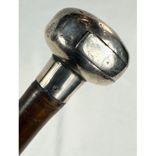 226 - A Victorian walking cane having cushion-shaped silver knop with concealed compartment, London, 1883,... 