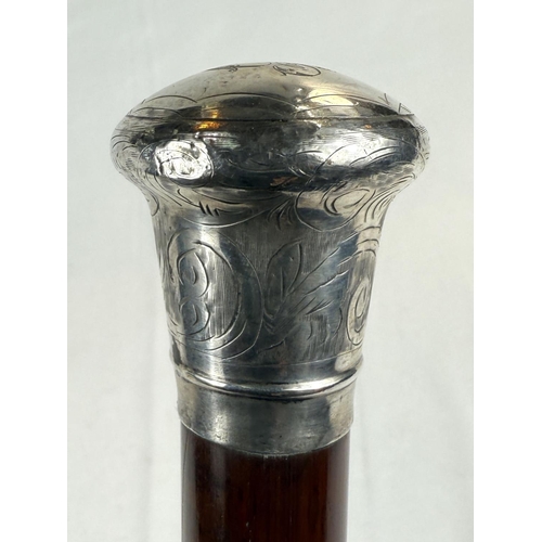 230 - A late-Victorian walking stick with hardwood tapering shaft and silver knop, London, 1883, 91cm.