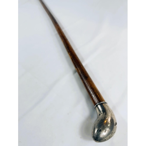 234 - A 19th Century Malacca cane with white metal finial, 88cm.