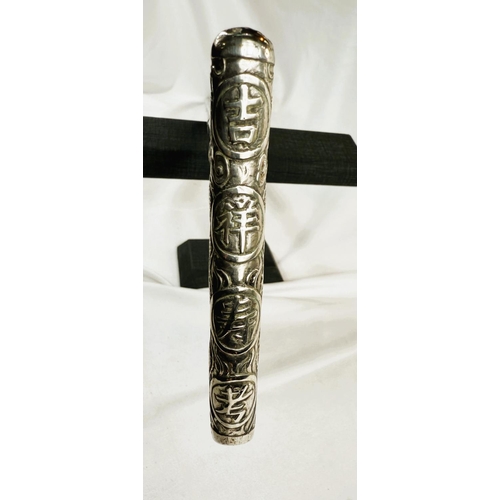 248 - A Chinese lady's ebonised walking stick with silver handle embossed with characters, 90cm.