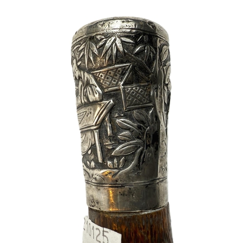 249 - A Chinese walking stick, the shaft with knobbly bark finish and having silver finial decorated in re... 