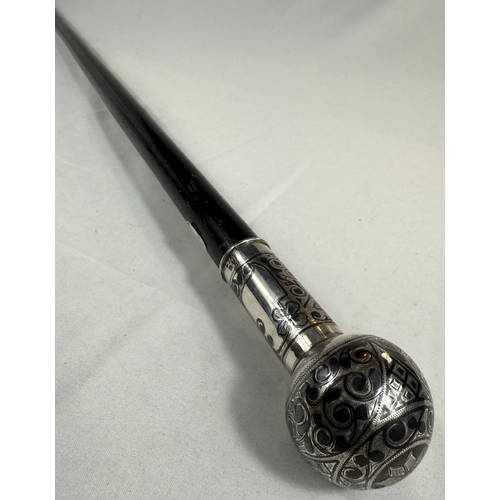 252 - A 19th Century Russian ebonised walking stick with 84 standard silver globe and shaft and decorated ... 