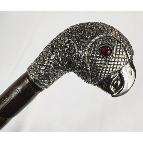 258 - A late Victorian lady's walking cane with silver finial in the form of a parrot's head with glass ey... 