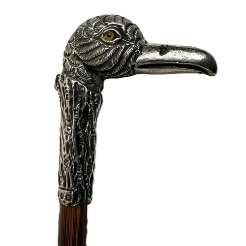 259 - A late Victorian lady's walking cane with silver bird's head finial complete with glass eyes, Birmin... 