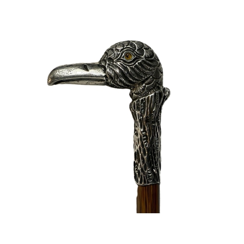 259 - A late Victorian lady's walking cane with silver bird's head finial complete with glass eyes, Birmin... 