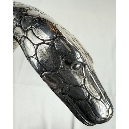 260 - A 19th Century heavy Malacca cane walking stick with silver handle in the form of a snake's head (un... 