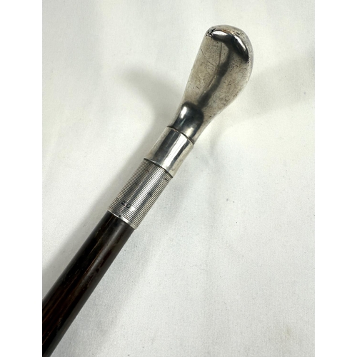 261 - A late Victorian walking cane with silver 'Sunday Stick' golf finial, Birmingham, 1895, 92cm.