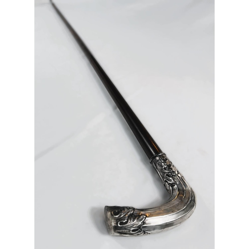 265 - An English walking stick circa 1900 with hardwood shaft and hallmarked silver cased handle with ribb... 