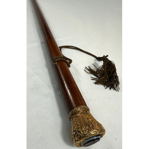 268 - An early 19th Century Malacca cane walking stick stamped 'Margadle' having embossed gilt metal crown... 