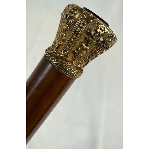 268 - An early 19th Century Malacca cane walking stick stamped 'Margadle' having embossed gilt metal crown... 