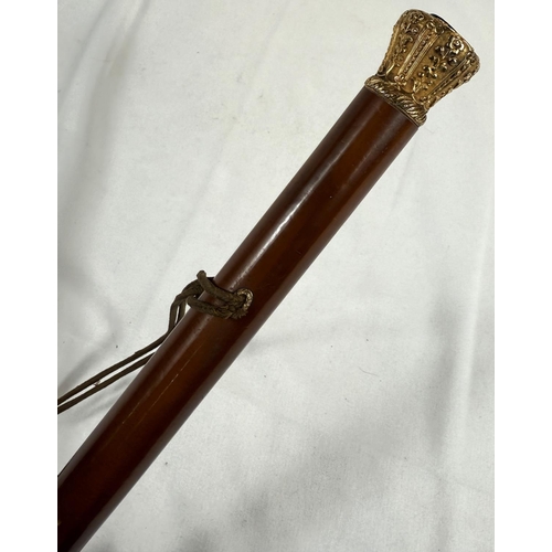 268 - An early 19th Century Malacca cane walking stick stamped 'Margadle' having embossed gilt metal crown... 