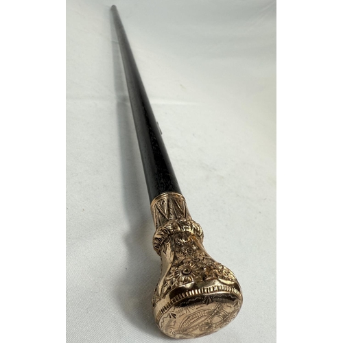 269 - A 19th Century ebonised walking stick with gilt metal floral engraved finial, 81cm.