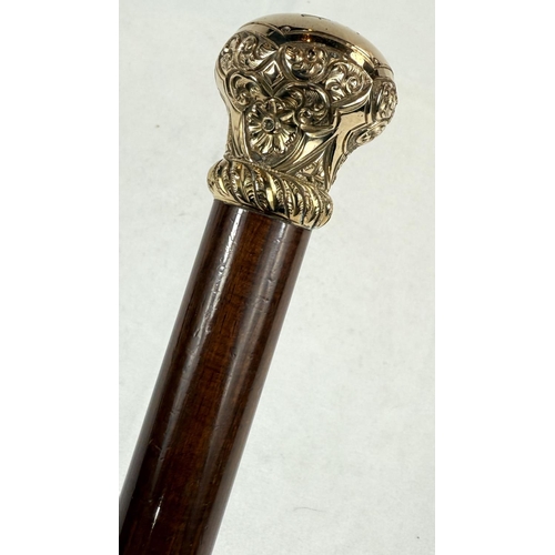 270 - A 19th Century hardwood walking stick with chased gilt metal cushion-shaped finial, 90cm.