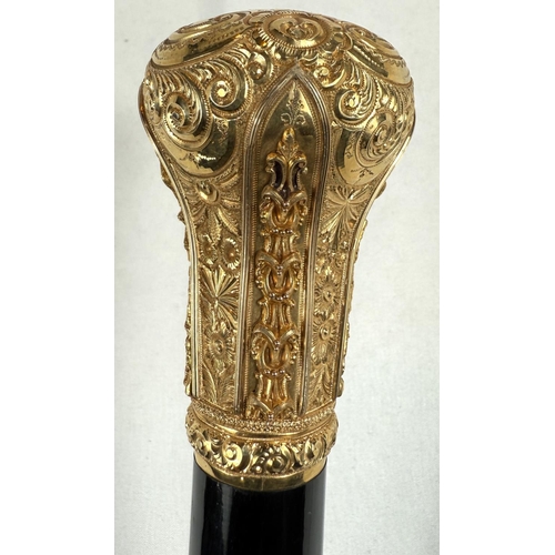 271 - A late Victorian presentation stick with tapering ebonised shaft, the gilt metal handle ornately dec... 