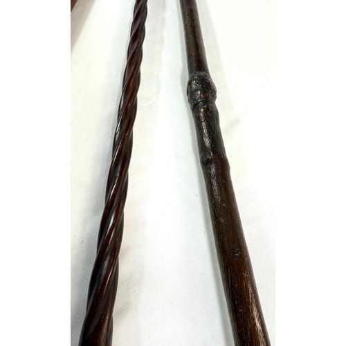 35 - A vintage stick with antler handle, 95cms, and two other sticks (3).