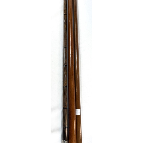 36 - A vintage Malacca cane walking stick with horn loop handle and silver mount, 95cm, and two others.