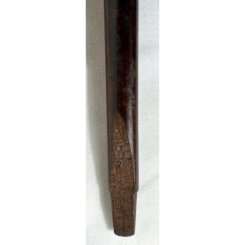 38 - An Edwardian slender hardwood stick with gilt inlaid steel handle, possibly Russian, 90cm.