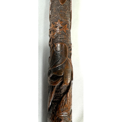 39 - A 19th Century Japanese bamboo walking cane with carved decoration of faunae, 89cm, and another with... 