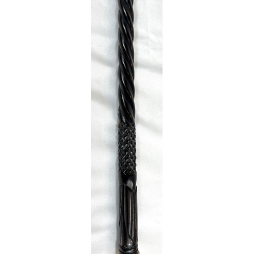 4 - A 19th Century ebony stick with carved ivory finial of a fierce dog, 89cms, and two other 19th Centu... 