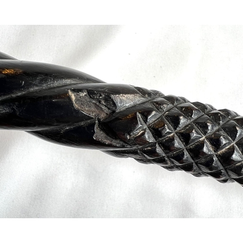 4 - A 19th Century ebony stick with carved ivory finial of a fierce dog, 89cms, and two other 19th Centu... 