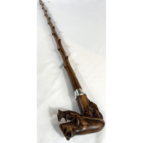 40 - A vintage branched wooden walking cane with carved rodent finial, 89cm.