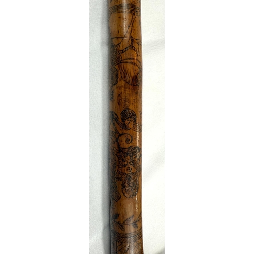 42 - A 19th Century colonial walking stick with animal head terminal and engraved decoration with Royal c... 