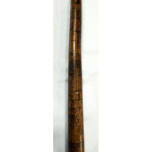 42 - A 19th Century colonial walking stick with animal head terminal and engraved decoration with Royal c... 