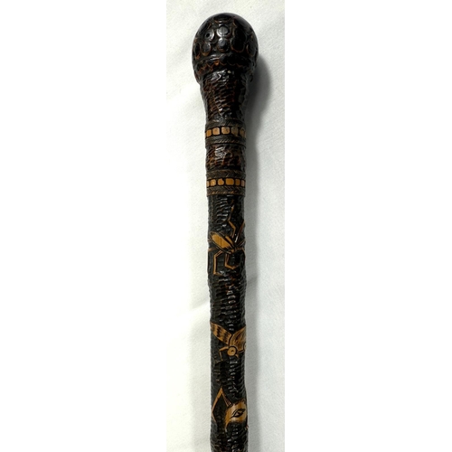 45 - A 19th Century Japanese carved bamboo walking cane decorated with theatrical masks, 89cm, and anothe... 