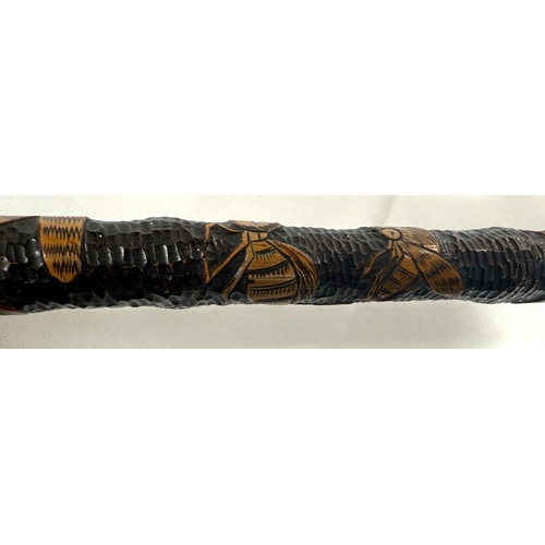 45 - A 19th Century Japanese carved bamboo walking cane decorated with theatrical masks, 89cm, and anothe... 