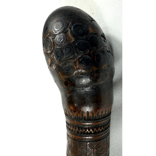 45 - A 19th Century Japanese carved bamboo walking cane decorated with theatrical masks, 89cm, and anothe... 