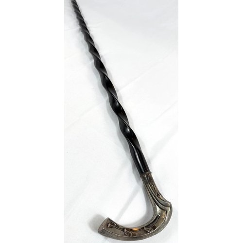 49 - An Art Nouveau continental walking stick with spiral ebony shaft and 800 standard silver handle, 90c... 