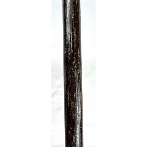 5 - A 19th Century ebonised stick with Japanese carved ivory handle and engraved silver band, 86cms, ano... 