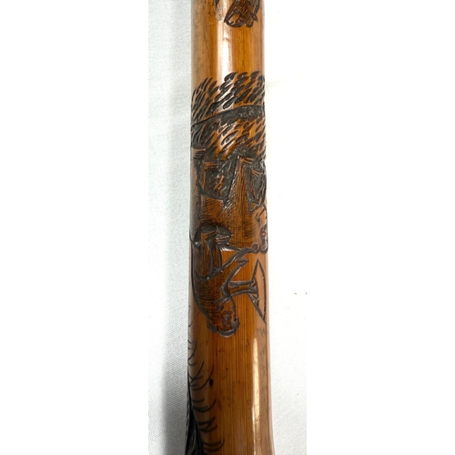 50 - A late 19th Century Japanese walking cane with carved decoration of insects, 88cm, and another (2).