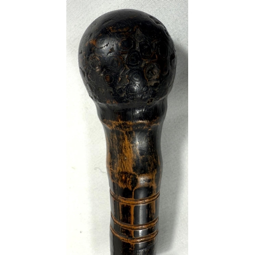 54 - A late 19th Century Japanese bamboo walking cane with carved decoration of a Samurai warrior, 87cm, ... 