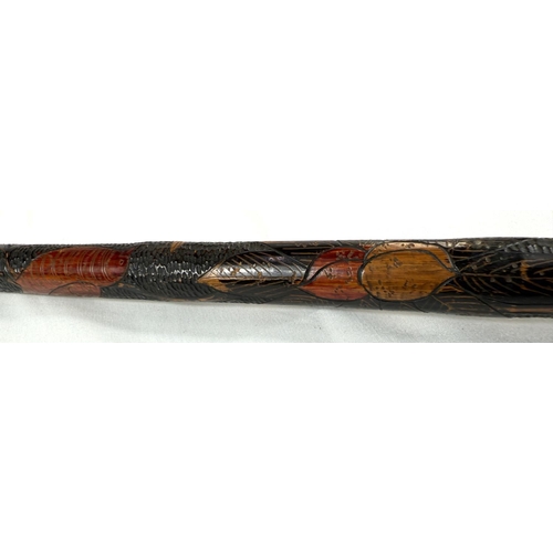 54 - A late 19th Century Japanese bamboo walking cane with carved decoration of a Samurai warrior, 87cm, ... 